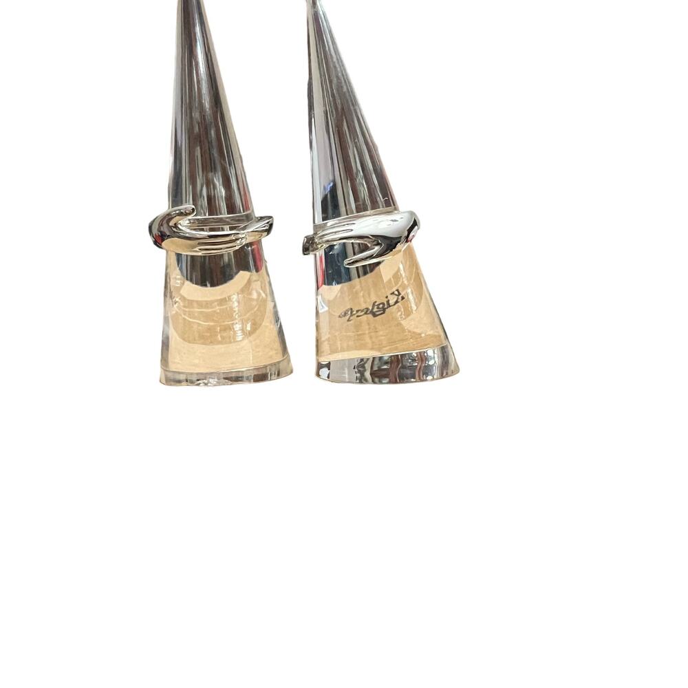 Title:
Stainless Steel Hand-Holding Couple Rings – Set of Two